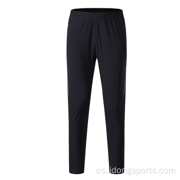 Pantalones de pista de corredera de entrenamiento sincero y seco